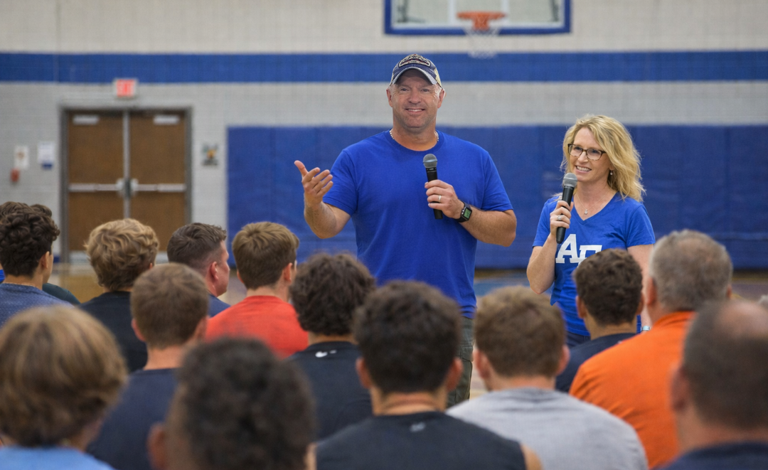 Athletes and coaches attending a Sports Hawgs mindset training session focused on confidence and leadership